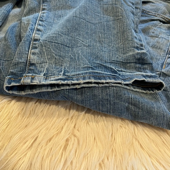 Torrid Blue Flare Jeans with Distressed Details - Picture 10 of 11